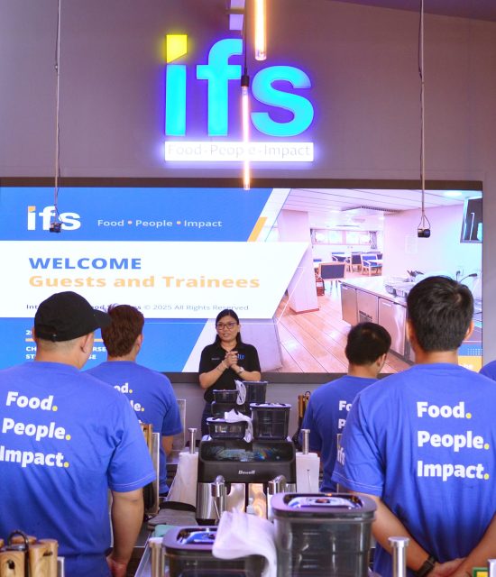 IFS maritime training session with crew members participating in hospitality and operational education programs.